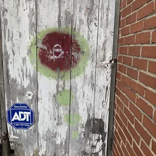 a door with graffiti on it