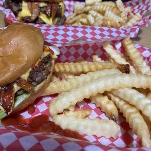 two burgers and french fries