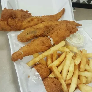 3 piece fish lunch special for $4.99. Comes with fries, hush puppies, and coleslaw.