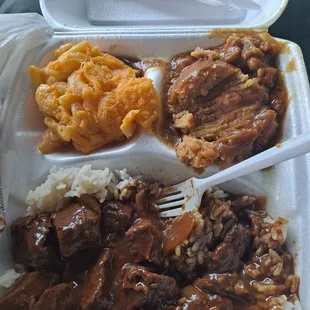 Pepper steak and mac and cheese and dressing