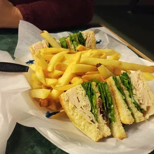 Club sandwich with fries