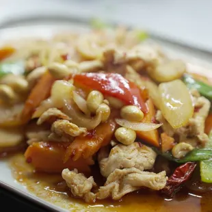 a plate of chicken and vegetables