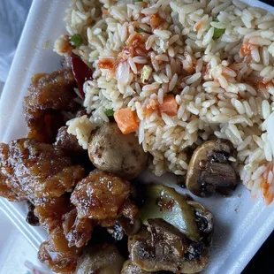 Fried rice, mushroom, spicy orange chicken.