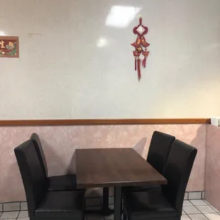 a table and chairs in a restaurant