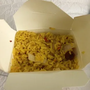 Pork fried rice tastes delicious with good sized chunks of meat and veggies, not at all dry either.