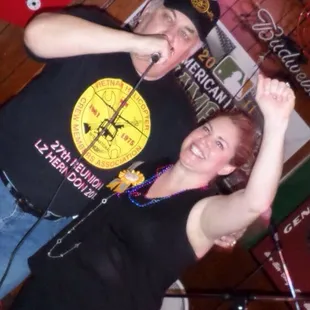 a man and a woman singing