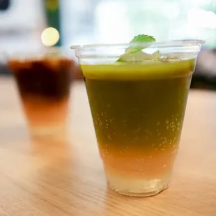 Honey Grove- Sparkling water, grapefruit juice, salted honey syrup &amp; matcha over ice.