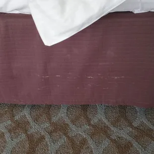 stained dirty bed skirt