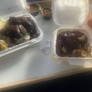 Jerk chicken rice, peas, and cabbage, noticed the burnt item on the side, which is supposed to be 11 dollar macaroni and cheese. . Burnt
