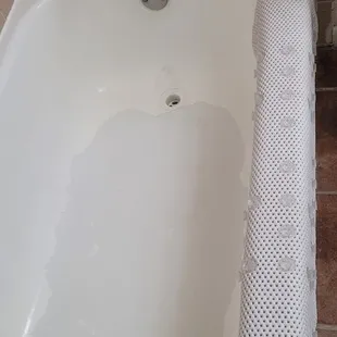Bathtub and tiles coming apart.
