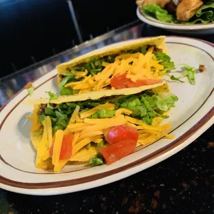 Crispy hard shelled tacos on the HH menu. Everyone loves a hard shell bar taco.