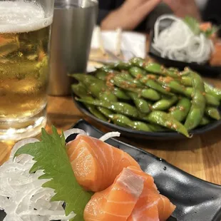 salmon sashimi, asahi beer, garlic edamame