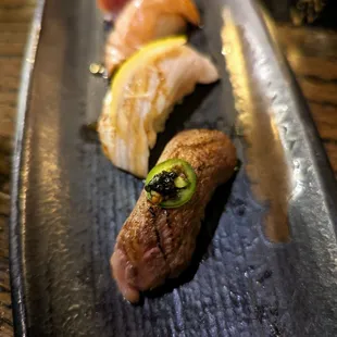 A5 Wagyu Beef Aburi (seared) from Chef&apos;s Signature Nigiri Menu. $77. Eight pieces of premium nigiri.