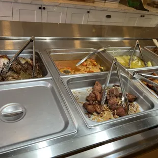 Lunch buffet: roast pork, chicken, plantains, yuca, etc!