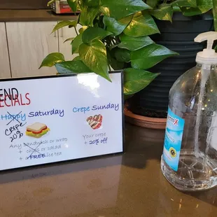 a sign and a bottle of water