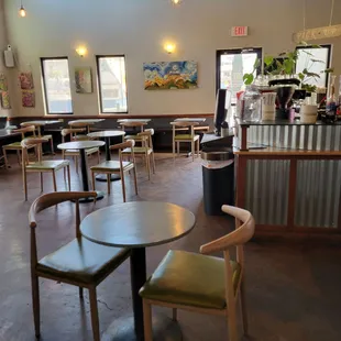 tables and chairs in a coffee shop
