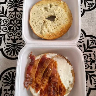 a bagel and bacon sandwich