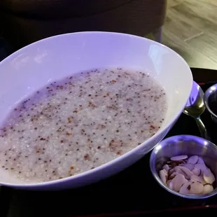 Kinley's spin on Congee. Almonds &amp; craisins on the side