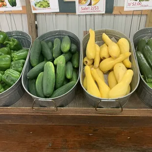 a variety of cucumbers and squash