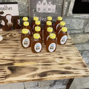 a display of honeys on a table