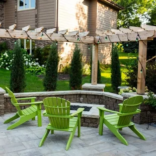 Paver patio, seat wall, firepit, &amp; pergola.