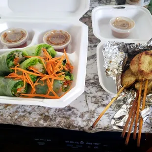 a chicken skewer and a salad