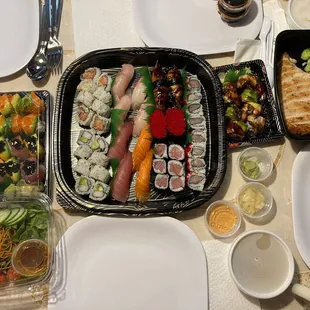 From top left - Cary roll, Bottom left - Morrisville roll, Center - sushi for two, dragon roll and chicken teriyaki.