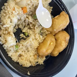 Sweet &amp; Sour chicken to go (sauce on the side which is awesome so it doesn&apos;t get soggy)
