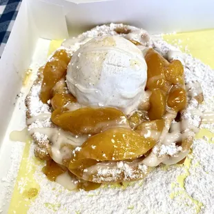 Peach Cobbler funnel cake with ice cream