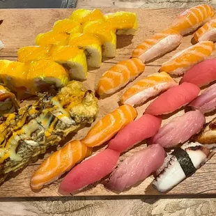 Salmon Nigiri Tuna Nigiri Mackerel Nigiri Octopus Nigiri Eel Nigiri Yellowtail Nigiri Nissan Roll Jeep Roll Audi Roll