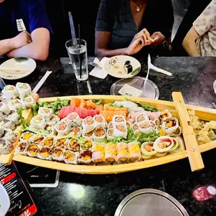 a large platter of sushi