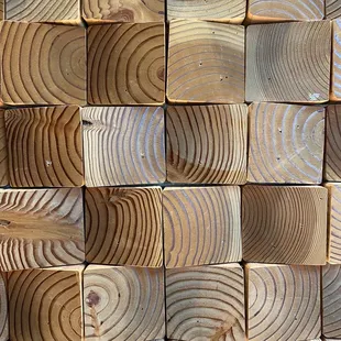 a close up of a pile of wood