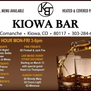 a glass of whiskey being poured into a glass