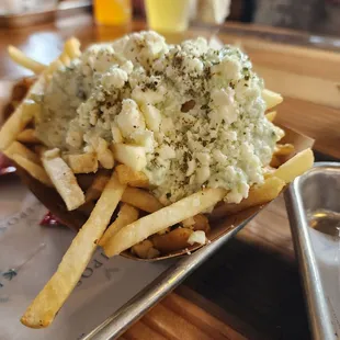 Fries with some greek stuff on it.  I forget what its called