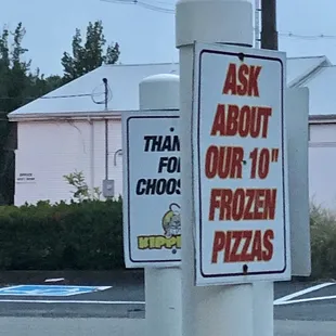 a sign for a frozen pizza