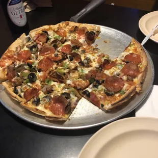 Loaded medium pizza with Cajun sausage added