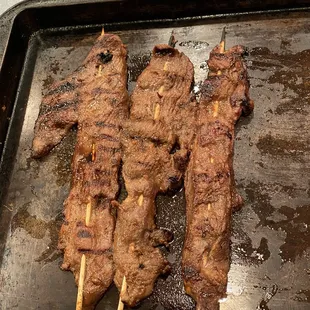 Thin sliced tenderloins marinated in Peach Bourbon BBQ sauce. The apple ginger bbq sauce is also banging.