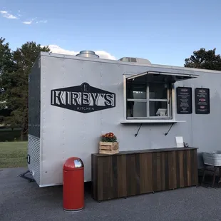 a food truck parked in a parking lot