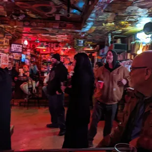 a group of people in a bar