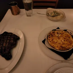 Ribeye, mashed potatoes, and potatoes au gratin