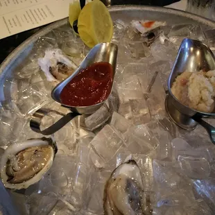 Have a dozen blue point oysters. Fresh and flavorful. And a Tito's martini with a twist.