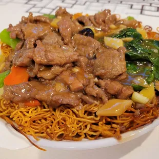 Pan fried crispy noodles with beef.