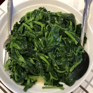 V112. Garlic with Snow Pea Vines