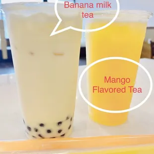 a glass of milk tea and a glass of mango flavored tea
