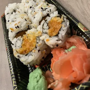 a close up of a plate of sushi