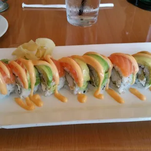 Shrimp tempura, cream cheese, salmon and avocado roll with spicy sauce.