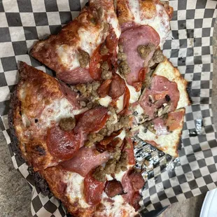 The 5 slices left of the &quot;Small Meat Lovers&quot;  The Two slices left was a small &quot;Small&quot; when started Sour dough Thin Crust Wander&apos;s