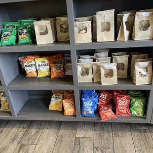 Below the counter, chips and cookies.