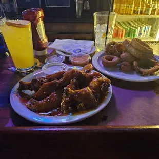 The onion rings are well done.  I love them extra crispy.  Mango habanero is my favorite here beating other places in the area.