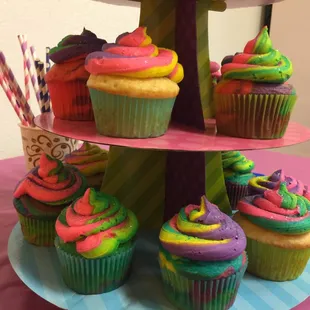 Custom rainbow cupcakes with rainbow glitter icing!